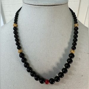 Black onyx and gold bead necklace